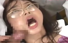 Nerdy Japanese woman gets her face and glasses covered with jizz